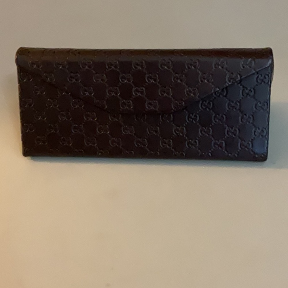 EUC gucci sunshade/ glasses holder
